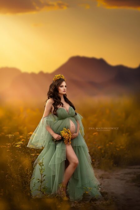 green tulle maternity gown with detachable sleeves outdoor photoshoot